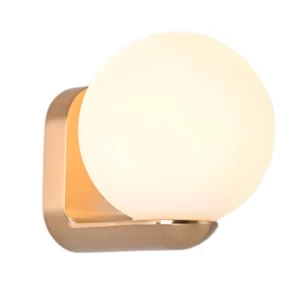 wall light with a glass orb shade in gold